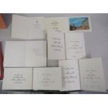 King Hussein of Jordan and family, folio containging ten photographs and six signed greetings cards