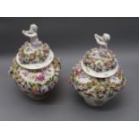 Pair of late 19th / early 20th Century Dresden porcelain oviform vases with covers, each