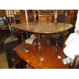 Regency mahogany rectangular breakfast table on a plain turned column support and moulded
