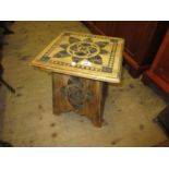 Small square carved beechwood occasional table together with a small Aesthetic movement stained pine