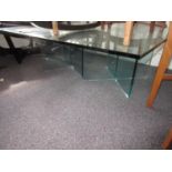 Modern glass coffee table, the square top 47.5ins, on twin crossover bases