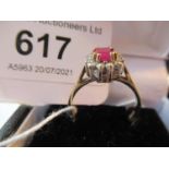 18ct Yellow gold ruby and diamond cluster ring
