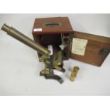 Small late 19th / early 20th Century brass monocular microscope in a mahogany case