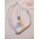 9ct White gold pearl and diamond pendant on a 9ct white gold chain