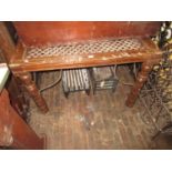 Antique Indian ironwork grill set into a table top, 44ins x 30ins high