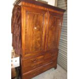 George III mahogany linen press, the moulded cornice above a pair of figured panel doors enclosing