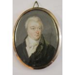 Early 19th Century watercolour portrait miniature of a gentleman wearing a black coat and white