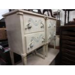 Suite of painted bedroom furniture comprising: a pair of two drawer bedside cabinets, four drawer