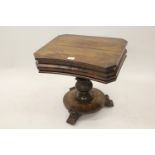 19th Century mahogany work table on carved turned column support, the circular base with three