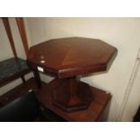 Art Deco octagonal mahogany coffee table on octagonal column and platform base