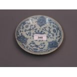 Small Chinese porcelain circular dish decorated with a stylised floral design, painted mark to the