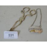 Pair of antique silver sugar nips and a Victorian silver sherry decanter label