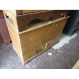 19th Century pine mule chest, the hinged lid above a void interior, the base with two drawers on