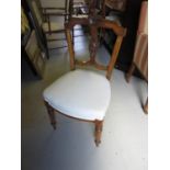 Set of six Victorian walnut drawing room chairs, the carved and pierced splat backs above cream