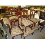 Late Victorian walnut nine piece drawing room suite comprising: ladies chair, gentleman's chair, six