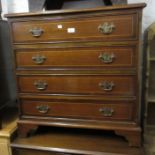 Reproduction mahogany line inlaid straight front chest of four drawers on bracket feet, 31ins wide x