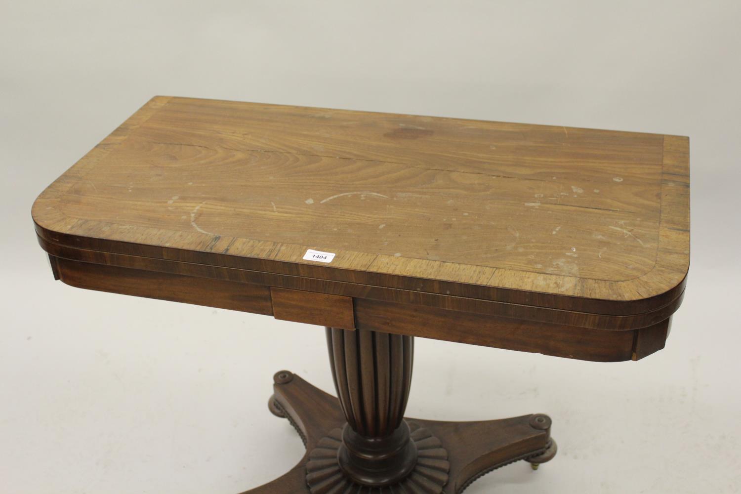 George IV mahogany rosewood crossbanded fold-over card table on fluted column and quadruped base ( - Image 2 of 2