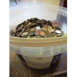 Large quantity of miscellaneous World coins in a plastic tub