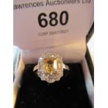 Platinum yellow sapphire and diamond cluster ring