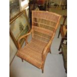Wicker arm chair by Dryad of Leicester, with original label to the seat frame