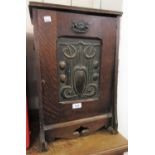 Art Nouveau oak coal purdonium with embossed copper panel inset fall front (at fault), together with