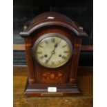 Edwardian mahogany floral inlaid dome shaped mantel clock, having silvered dial with Roman