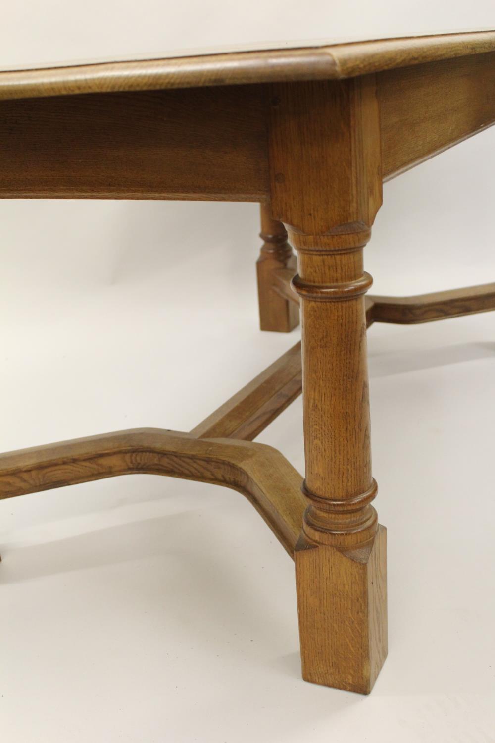 Alan Grainger of Brandsby ' Acorn Man ', an oak refectory style dining table, the moulded top - Image 2 of 3