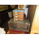 Two small early 20th Century rustic banks of four and three drawers with knob handles