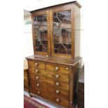 George III mahogany secretaire bookcase, the moulded cornice above a pair of astragal glazed doors