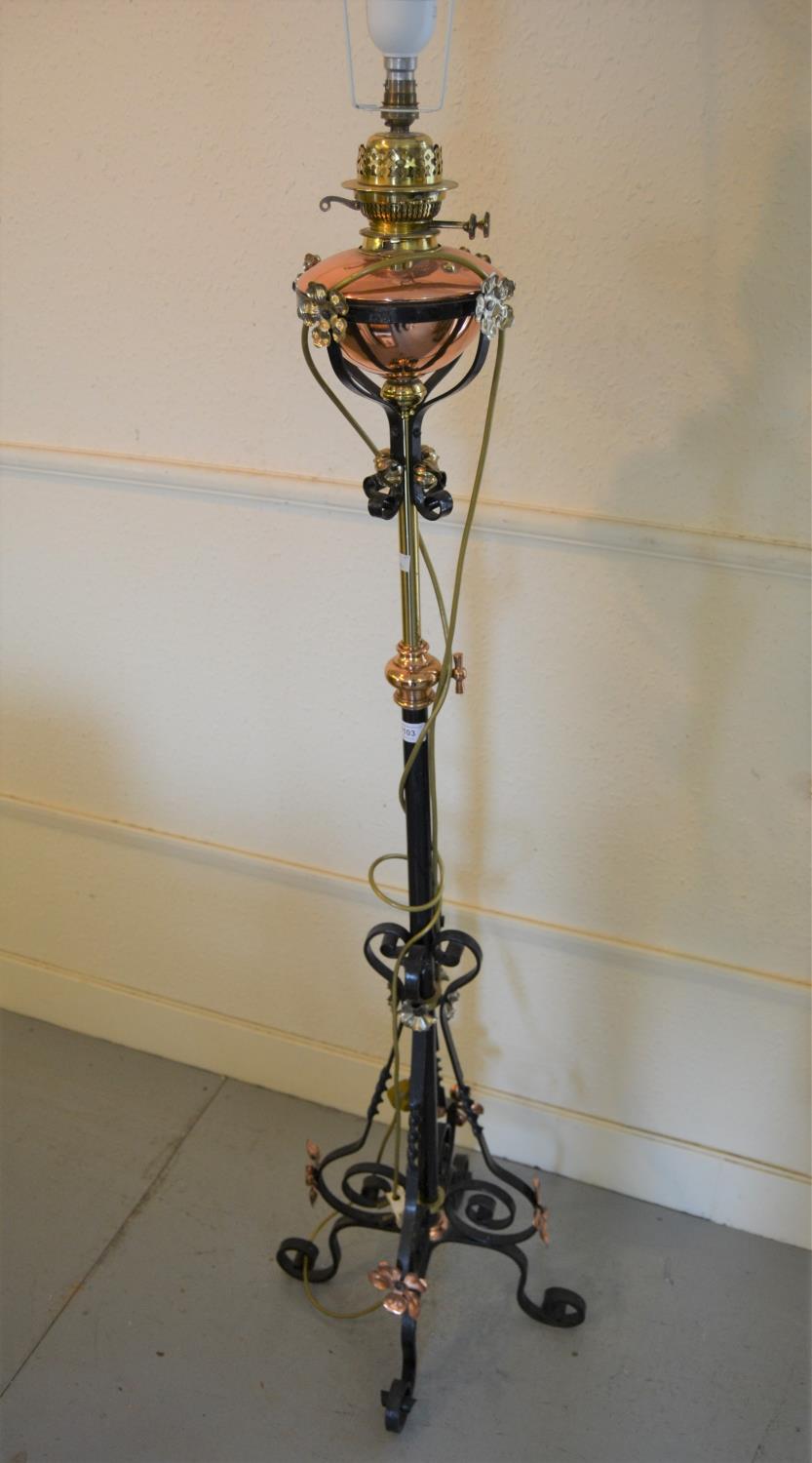 Arts and Crafts wrought iron, brass and copper mounted oil lamp standard adapted for use with
