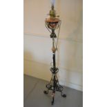 Arts and Crafts wrought iron, brass and copper mounted oil lamp standard adapted for use with