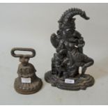 Victorian cast iron doorstop marked AR and Sons together with a later cast iron doorstop in the form