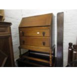 Oak bureau circa 1930 with two drawers on turned supports with stretcher, 30ins wide