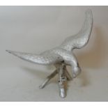 Late 20th Century cast brassed figure of a bird of prey on a branch ( with later silvered