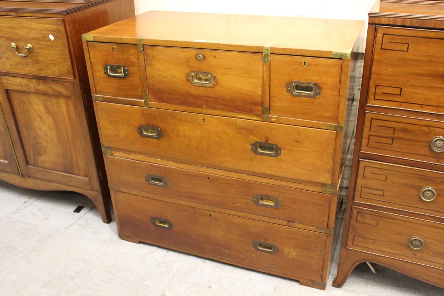 19th Century mahogany and brass bound two part secretaire military chest, the fitted central