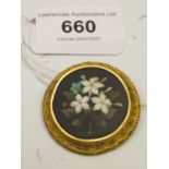 Victorian circular yellow metal brooch inset with a Pietra Dura floral hardstone panel
