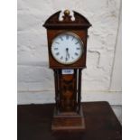 Edwardian rosewood and marquetry inlaid miniature longcase clock with a circular enamel dial,