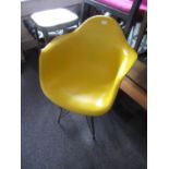 Charles Eames DAR chair on wrought iron Eifel Tower support (later sprayed yellow)