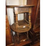 Pair of circular reproduction oak occasional tables on turned supports with stretchers Both are