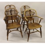 Harlequin set of four 19th Century ash and elm Windsor chairs, the hoop stick and pierced splat