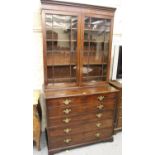 George III mahogany secretaire bookcase, the moulded cornice above a pair of bar glazed doors