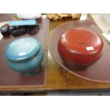 20th Century Chinese red lacquer and metal bound barrel form box and cover, together with a