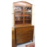 Regency mahogany and black line inlaid secretaire bookcase, the moulded cornice above a pair of