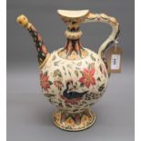 Zsolnay Pecs floral and bird decorated pedestal wine ewer, 12ins high (with restorations) Has a