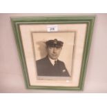 Dorothy Wilding, signed photograph of a man wearing a Naval cap, 8ins x 6ins approximately