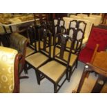 Set of eight (six plus two) Edwardian mahogany dining room chairs with carved splat backs, drop-in