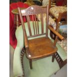 Child's early 20th Century Arts and Crafts stained beechwood spindle back open elbow chair,