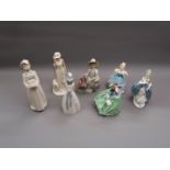 Lladro figure of a girl with turkeys, three various Royal Doulton figures, a Nao figure and two
