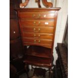 Edwardian mahogany music cabinet with five drop front drawers, brass handles and square tapered