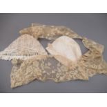 Two antique lace childrens bonnets together with a lace collar